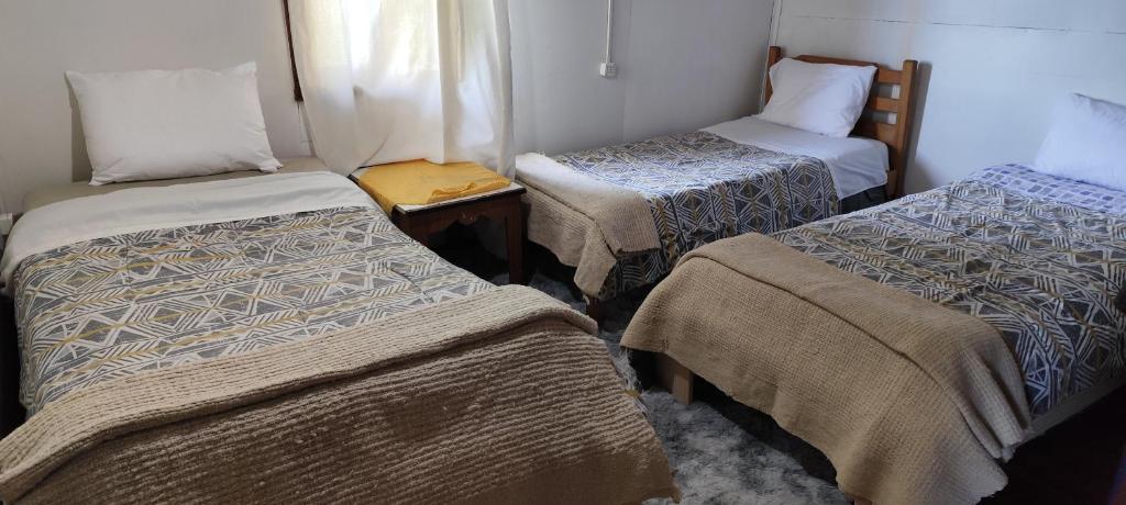 Postel nebo postele na pokoji v ubytování La Casa de Sandrita