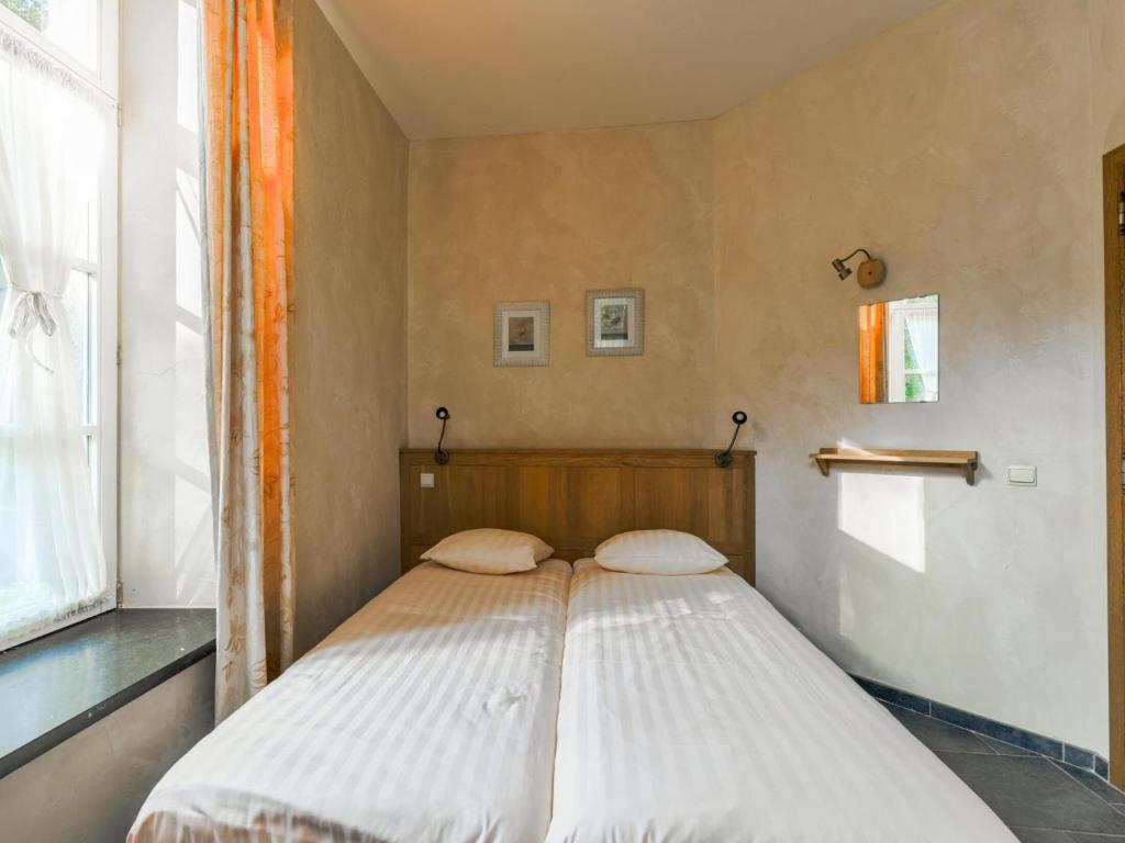 Postel nebo postele na pokoji v ubytování Apartment in Aywaille near Château de Dieupart
