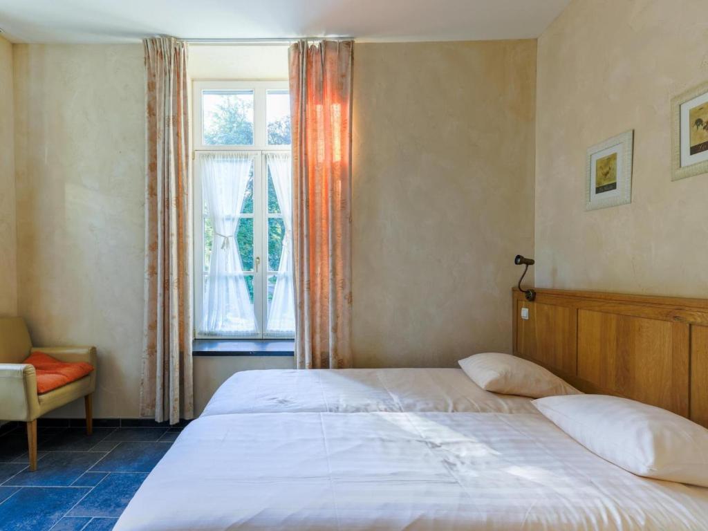 Postel nebo postele na pokoji v ubytování Apartment in Aywaille near Château de Dieupart