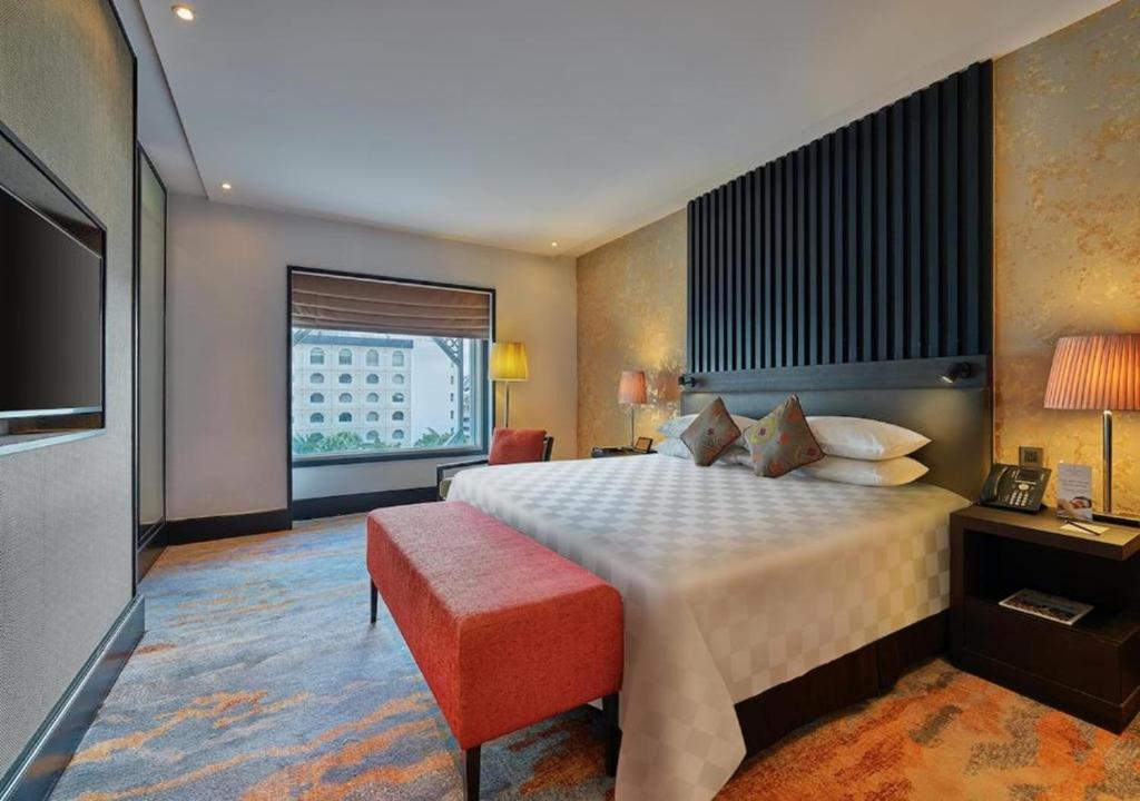 Postel nebo postele na pokoji v ubytování Sama Sama Hotel KLIA