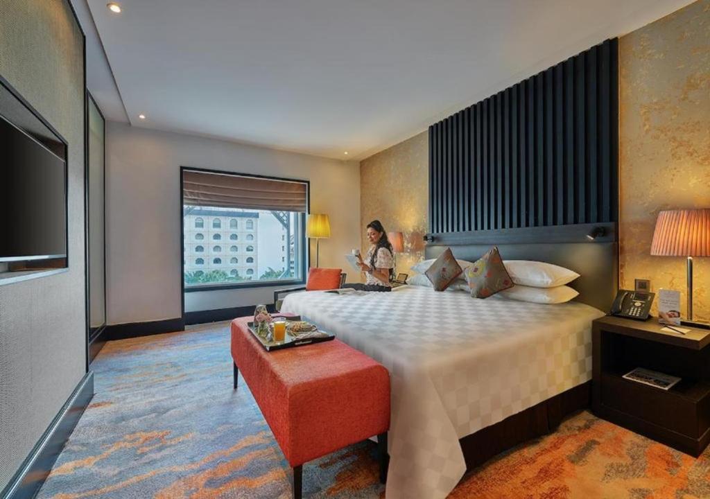 Postel nebo postele na pokoji v ubytování Sama Sama Hotel KLIA