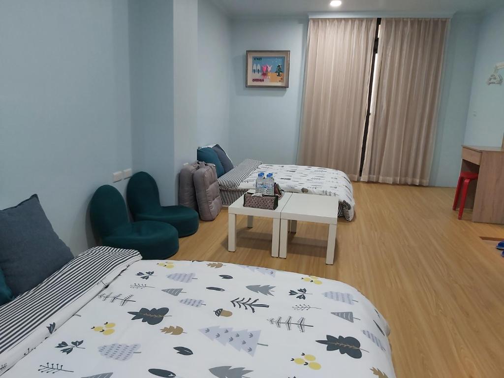 Postel nebo postele na pokoji v ubytování Chin-Lan B&B