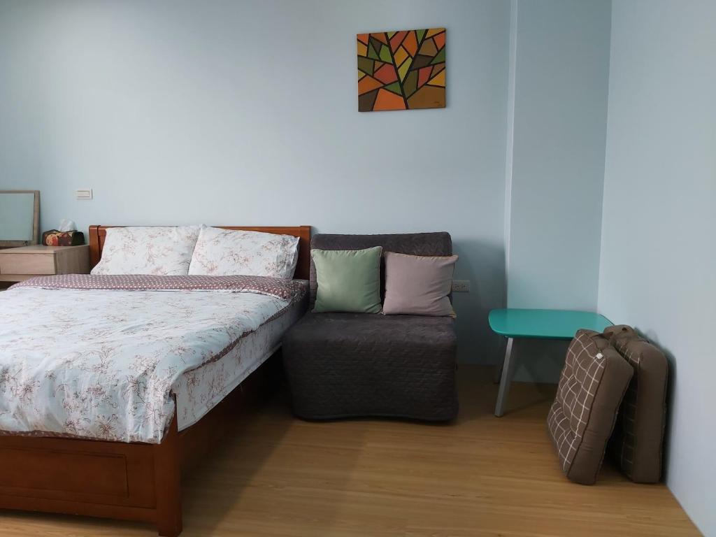Postel nebo postele na pokoji v ubytování Chin-Lan B&B