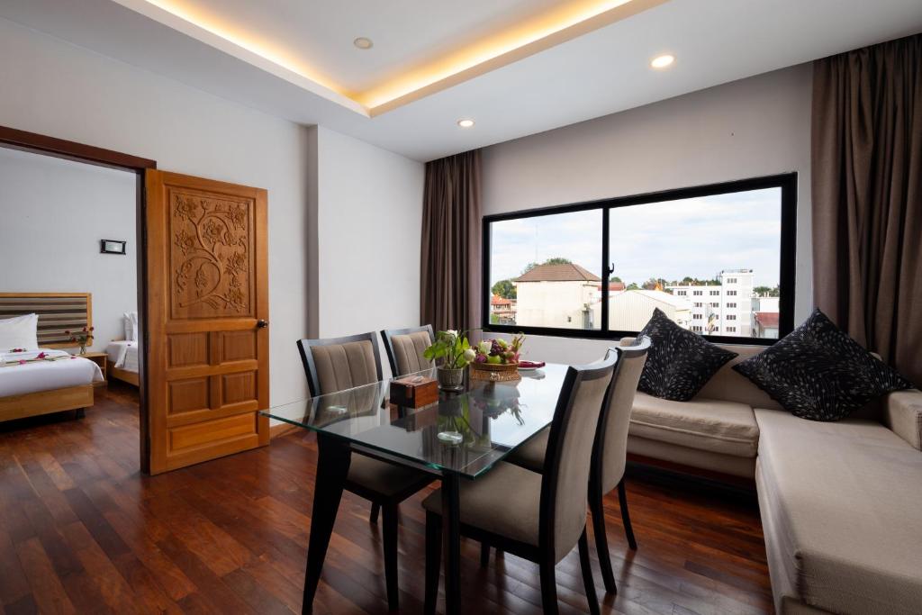 Postel nebo postele na pokoji v ubytování SIEM REAP RIVER VIEW Residence