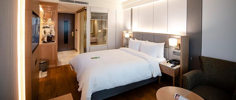 Postel nebo postele na pokoji v ubytování Hotel Interburgo Daegu