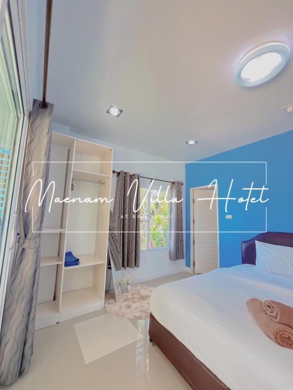 Postel nebo postele na pokoji v ubytování Maenam Villa Hotel