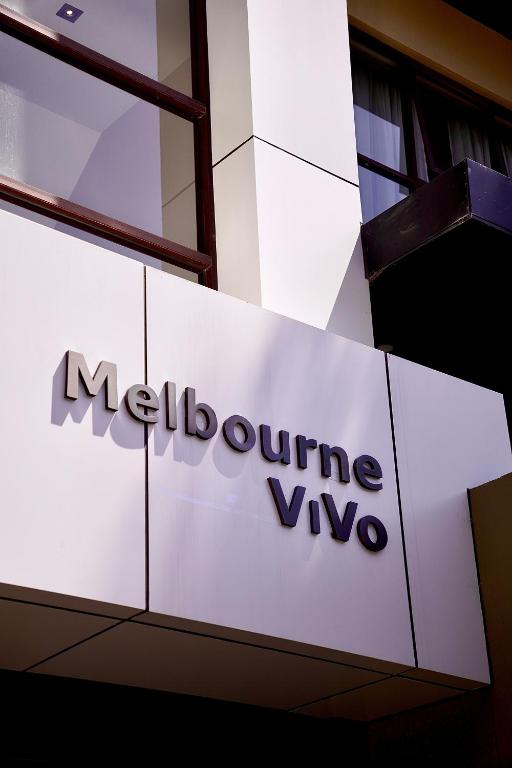 a sign for a moglouvyvy sign on a building at Melbourne ViVo in Melbourne
