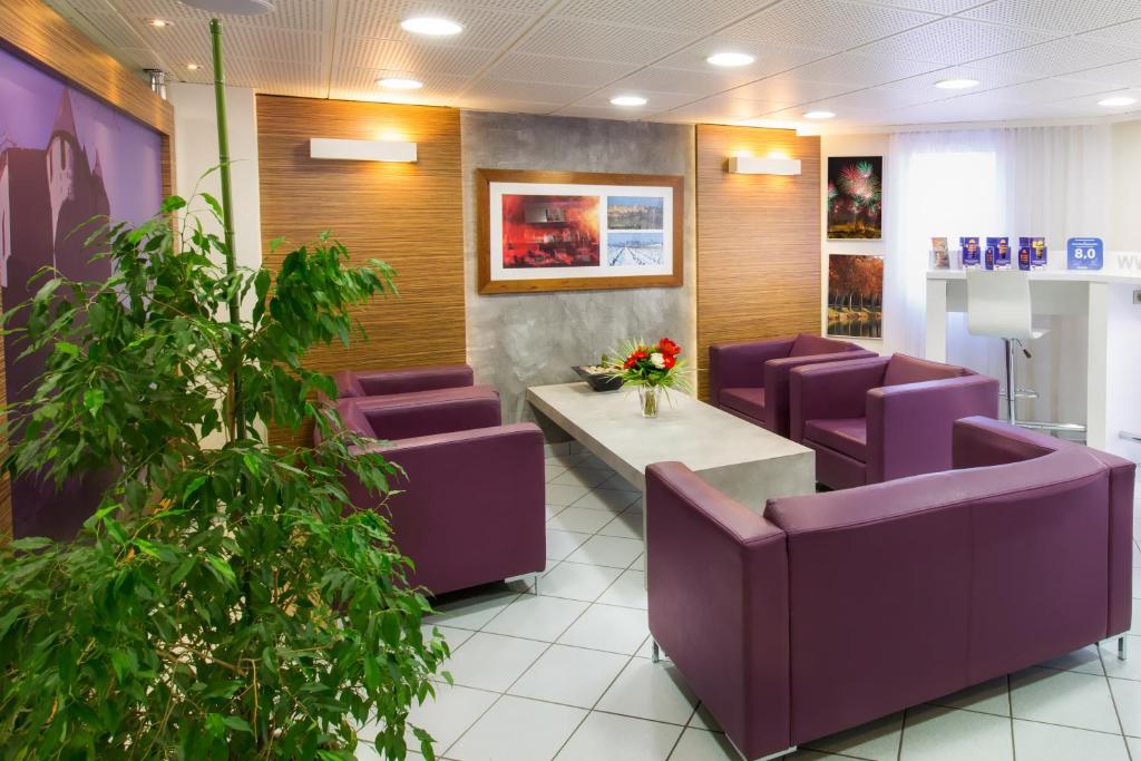 Posezení v ubytování Hotel Espace Cite