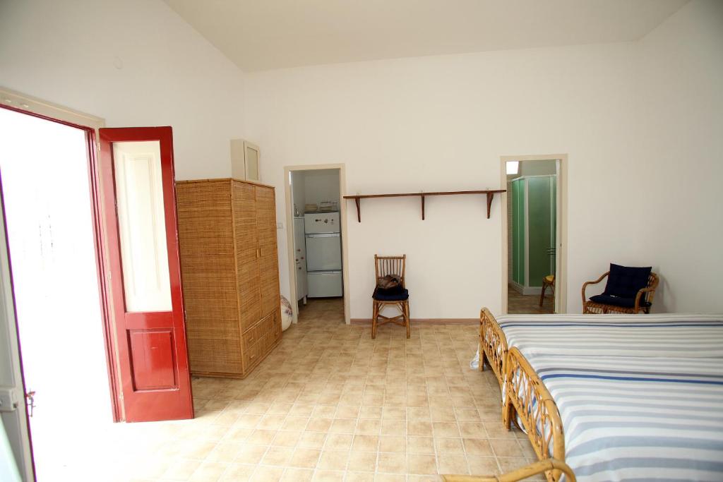 Postel nebo postele na pokoji v ubytování Paradise
