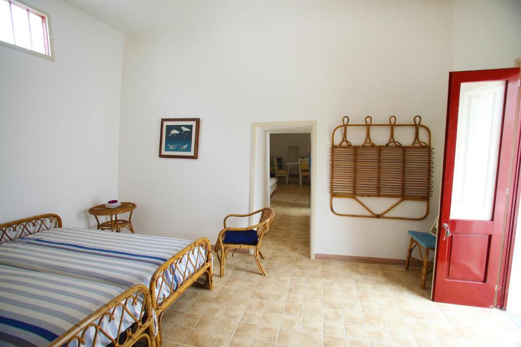 Postel nebo postele na pokoji v ubytování Paradise