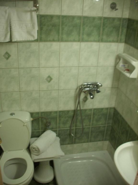 Kúpeľňa v ubytovaní Claridge Hotel