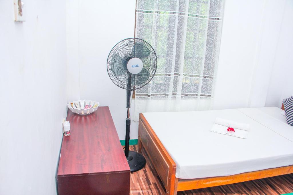 Postel nebo postele na pokoji v ubytování The Sigiriya Rock Hostel