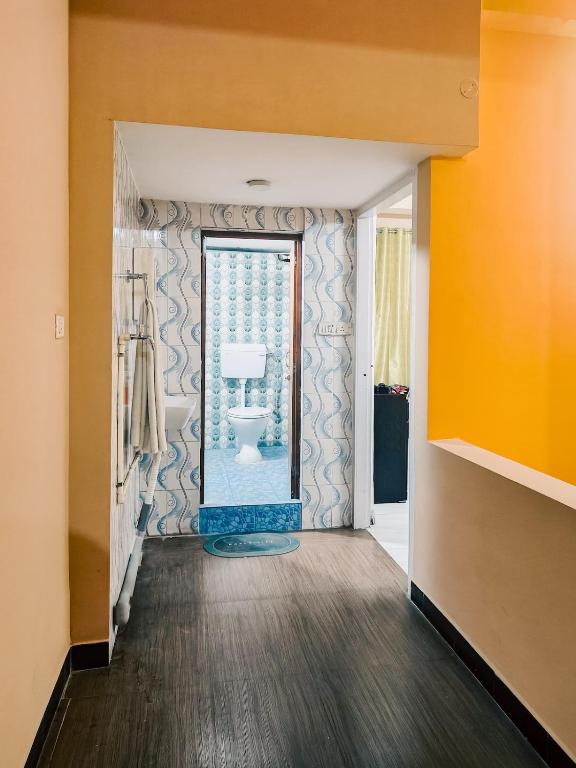 Postel nebo postele na pokoji v ubytování Tulip Guest house Flat - 3BHK Near Kamakhya