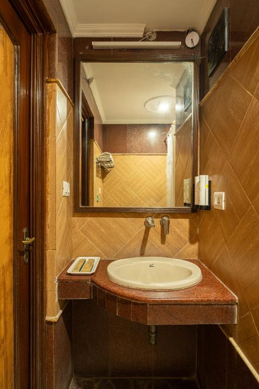 Koupelna v ubytování Hotel Sunstar Grand