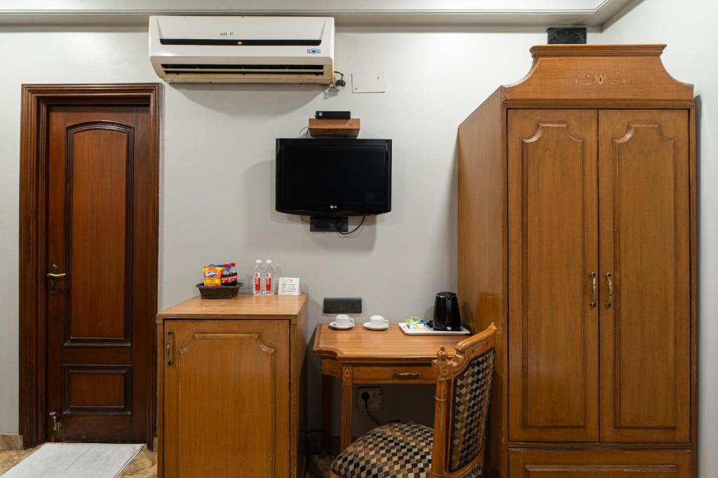 TV a/nebo společenská místnost v ubytování Hotel Sunstar Grand