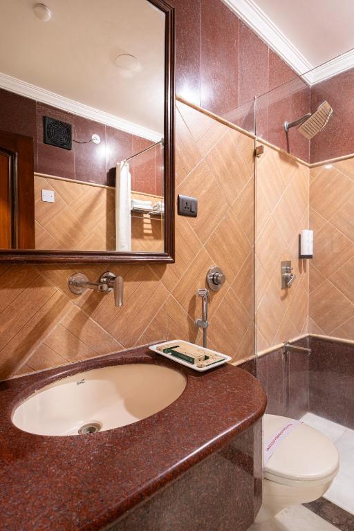 Koupelna v ubytování Hotel Sunstar Grand