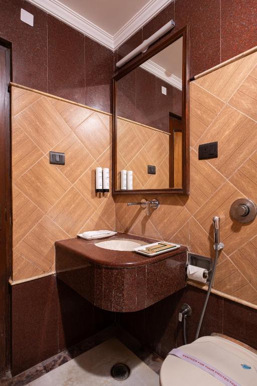 Koupelna v ubytování Hotel Sunstar Grand