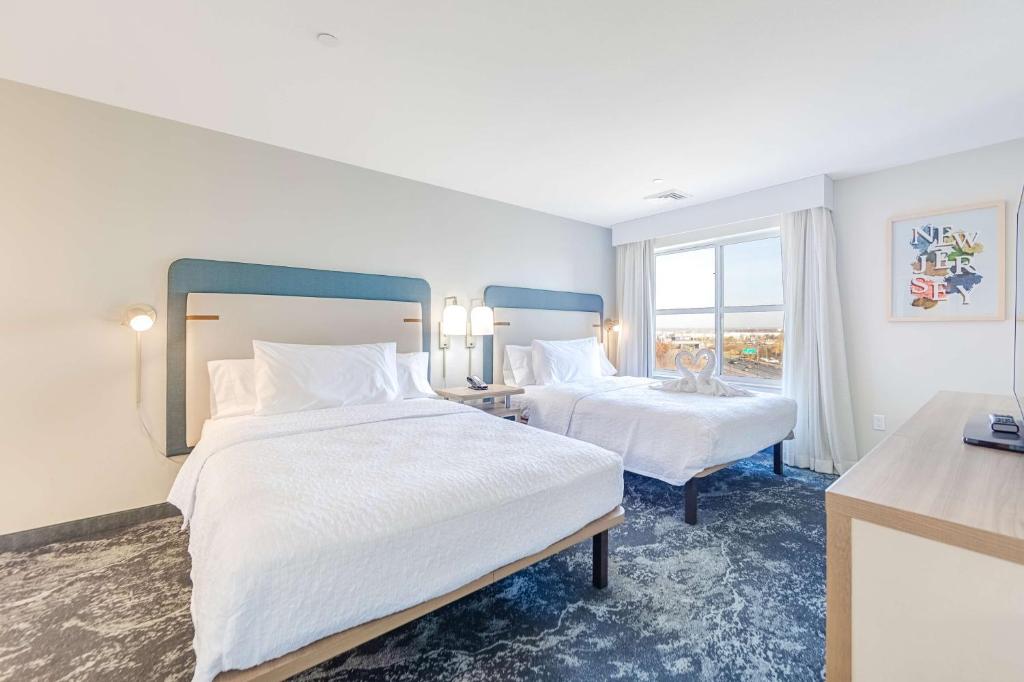 Postel nebo postele na pokoji v ubytování Homewood Suites by Hilton East Rutherford - Meadowlands, NJ
