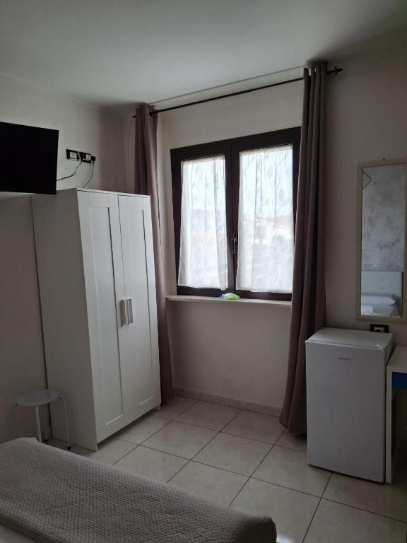 Kuchyň nebo kuchyňský kout v ubytování B&B Da Rocco