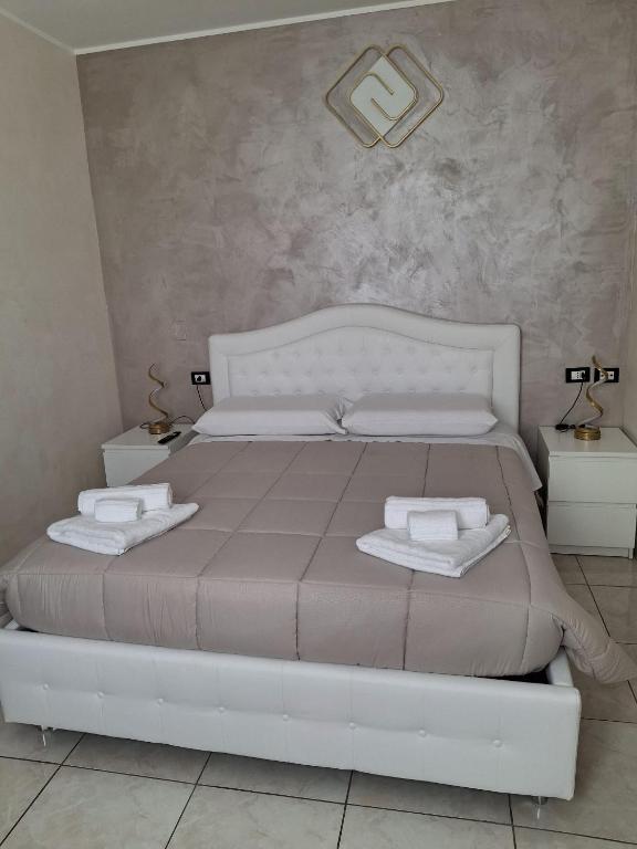 Postel nebo postele na pokoji v ubytování B&B Da Rocco