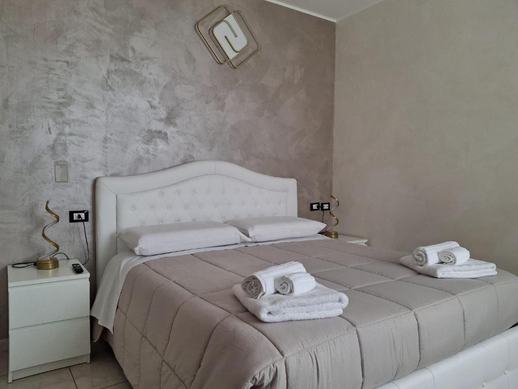 Postel nebo postele na pokoji v ubytování B&B Da Rocco
