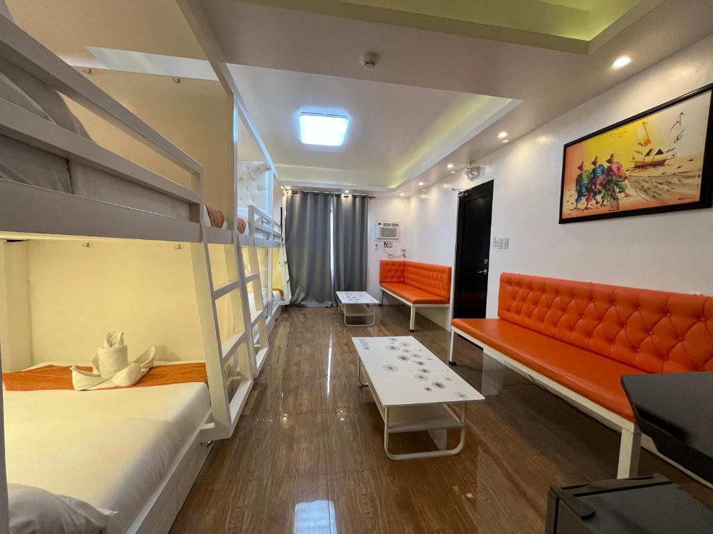 Postel nebo postele na pokoji v ubytování Rangya Hotel