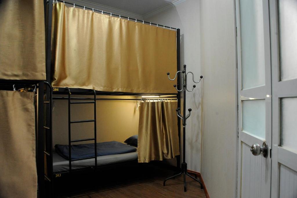 Postel nebo postele na pokoji v ubytování Hà Nội 71 Hàng Đào - Gia Ngư