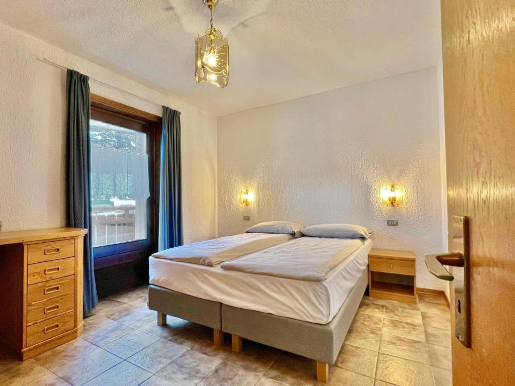 Postel nebo postele na pokoji v ubytování Residence Adele