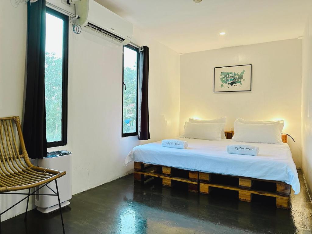 Krevet ili kreveti u jedinici u okviru objekta Pig Dive Hostel Moalboal