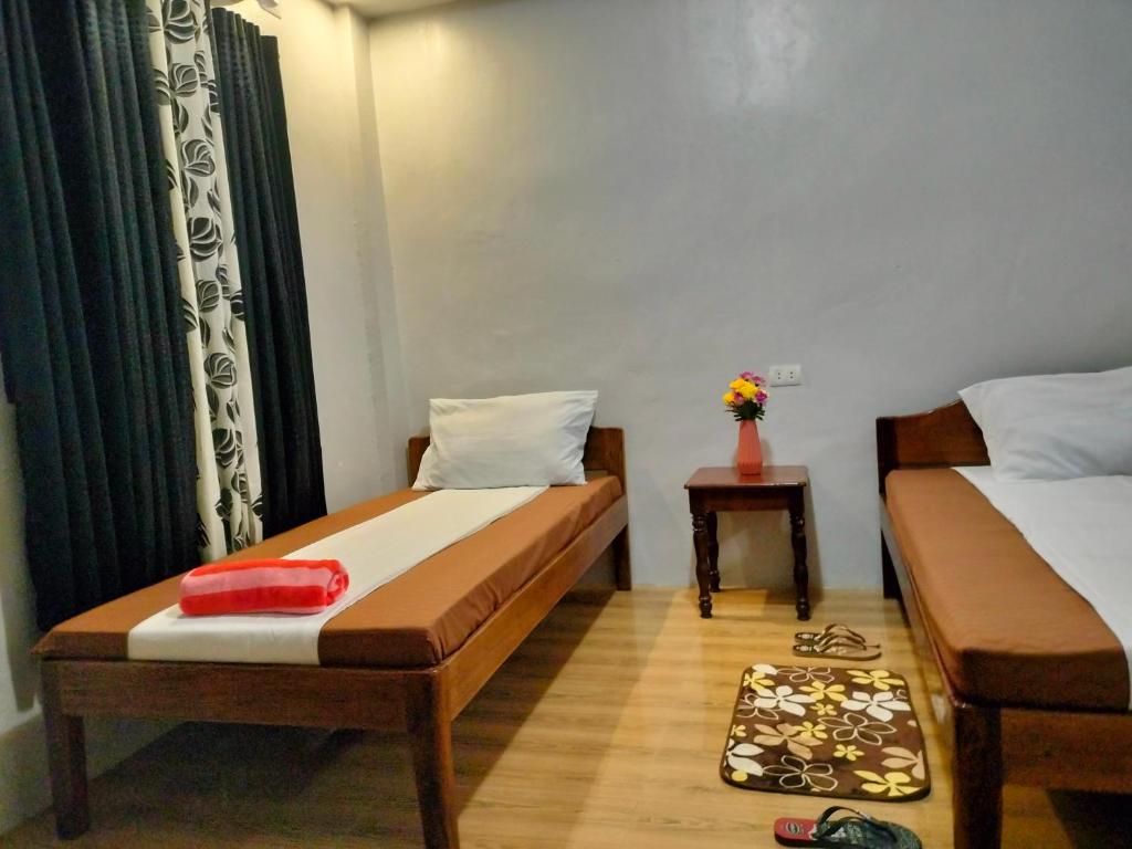 Postel nebo postele na pokoji v ubytování EL3 Z'sPLACE HOSTEL