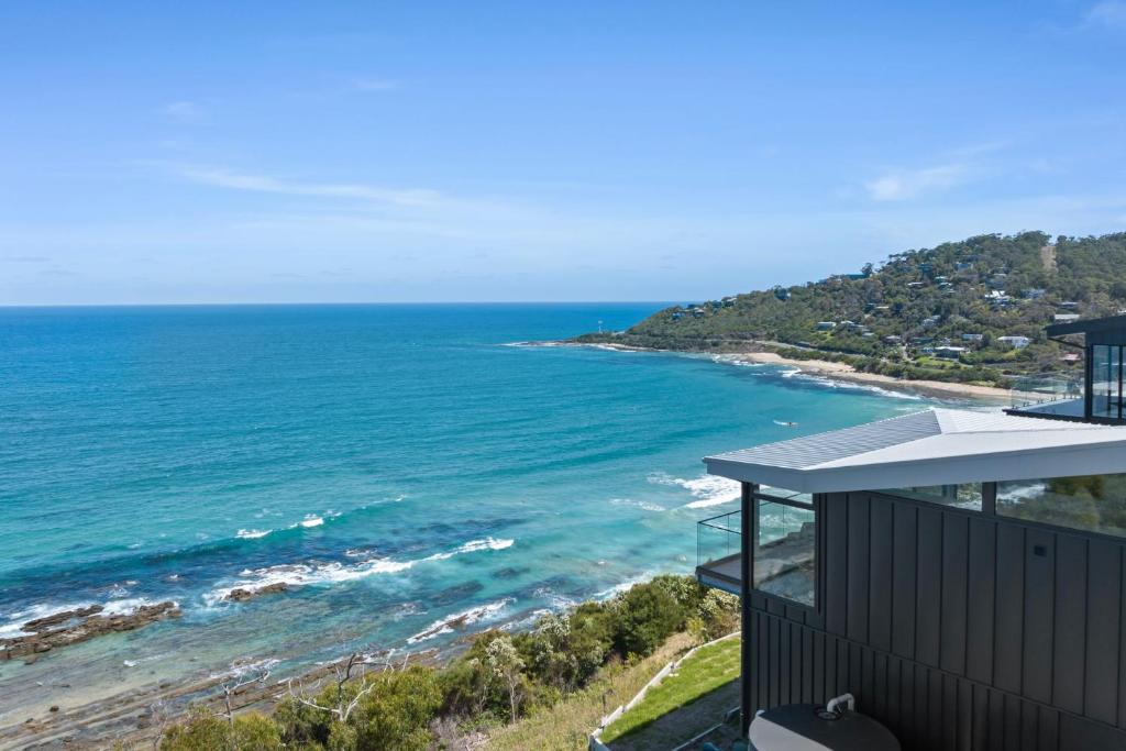 a view of the ocean from a house at Iluka Lookout in Wye River