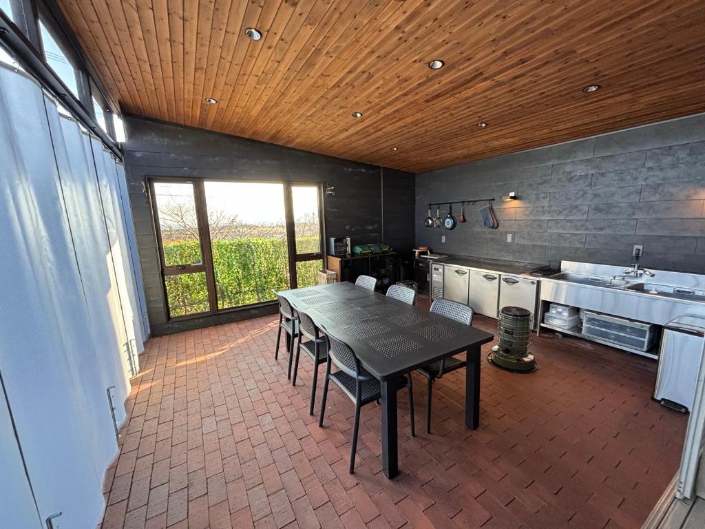 Kuchyň nebo kuchyňský kout v ubytování Villa CORTILE