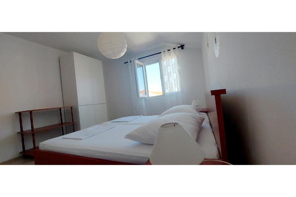 Postel nebo postele na pokoji v ubytování House Katarina