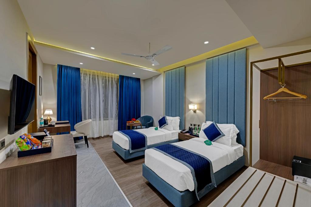 Voodi või voodid majutusasutuse Click Collection Grand Gateway Varanasi toas