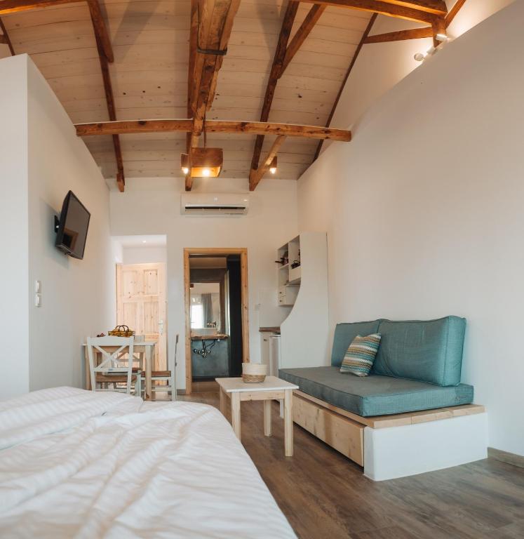 Postel nebo postele na pokoji v ubytování Votsalo Cozy Apartments