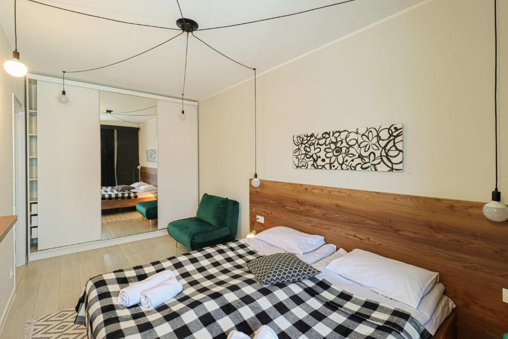 Postel nebo postele na pokoji v ubytování Super Bright&Stylish Apartment In Gudauri