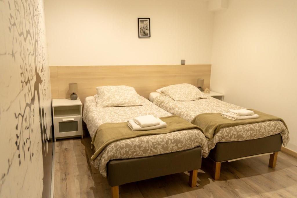 Katil atau katil-katil dalam bilik di Appartement 1-4 pers - Aéroport CDG, Parc Expo, Villepinte - A L'Ombre du Pin "9"
