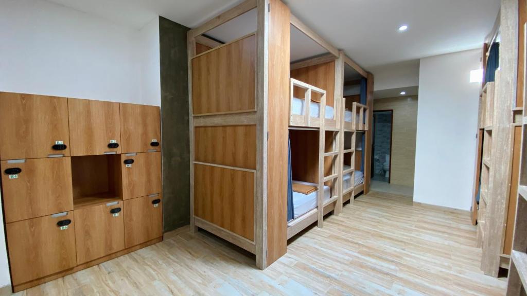 Postel nebo postele na pokoji v ubytování Pepitu Dormitory By Sandat