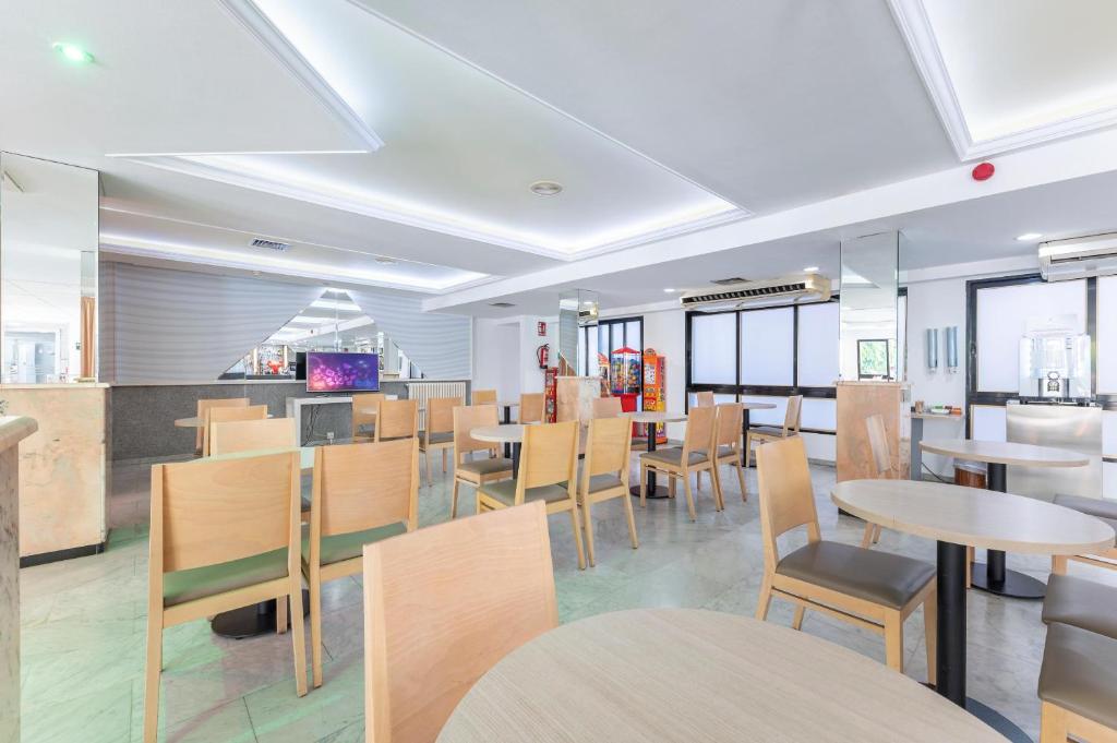 Reštaurácia alebo iné gastronomické zariadenie v ubytovaní Port Vista Oro