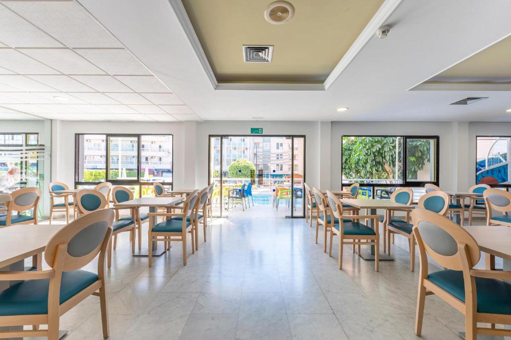 Reštaurácia alebo iné gastronomické zariadenie v ubytovaní Port Vista Oro