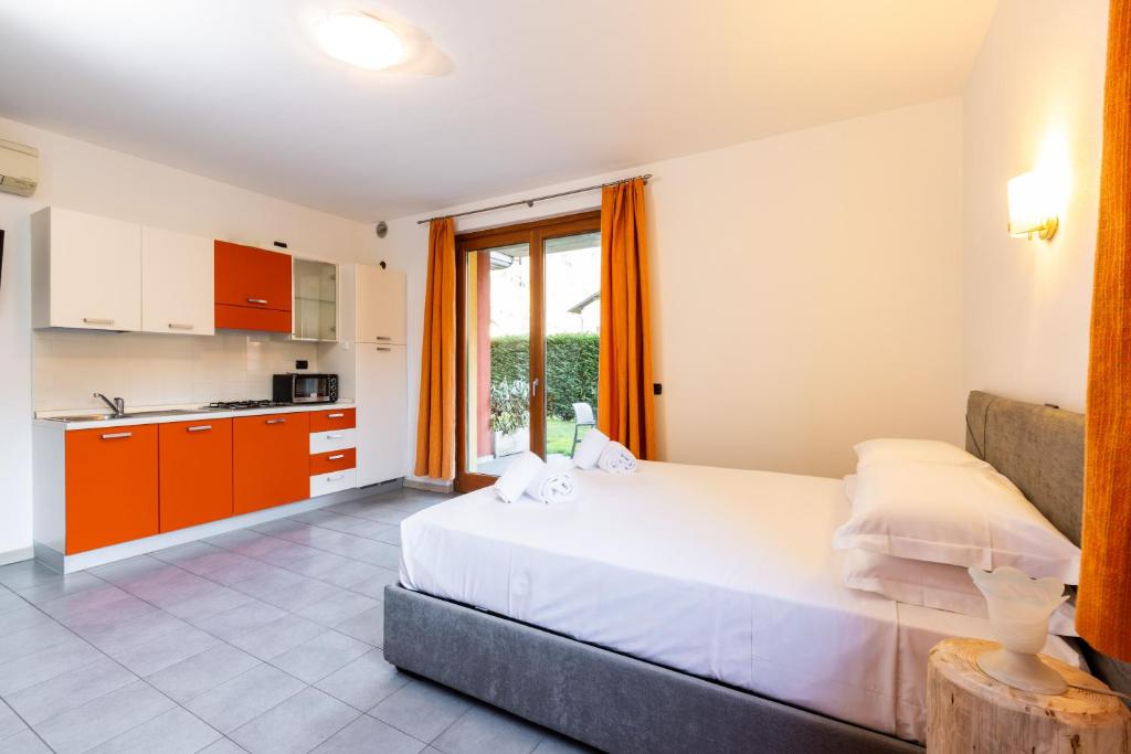 Kuchyň nebo kuchyňský kout v ubytování Spluga "Relax & Apartaments" by Alfio Colombo