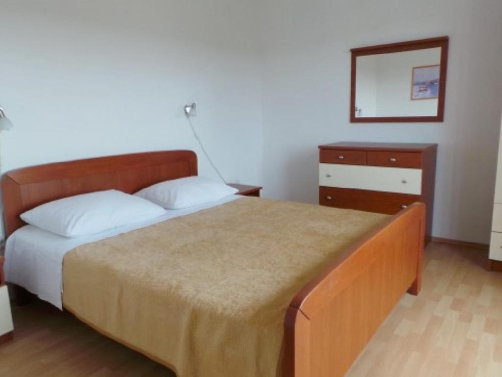 Posteľ alebo postele v izbe v ubytovaní Apartment Ivo
