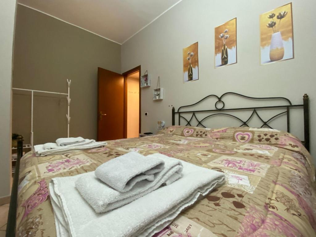 Postel nebo postele na pokoji v ubytování Casa Giulia FORUM ASSAGO M2 M1 Milano CENTRO