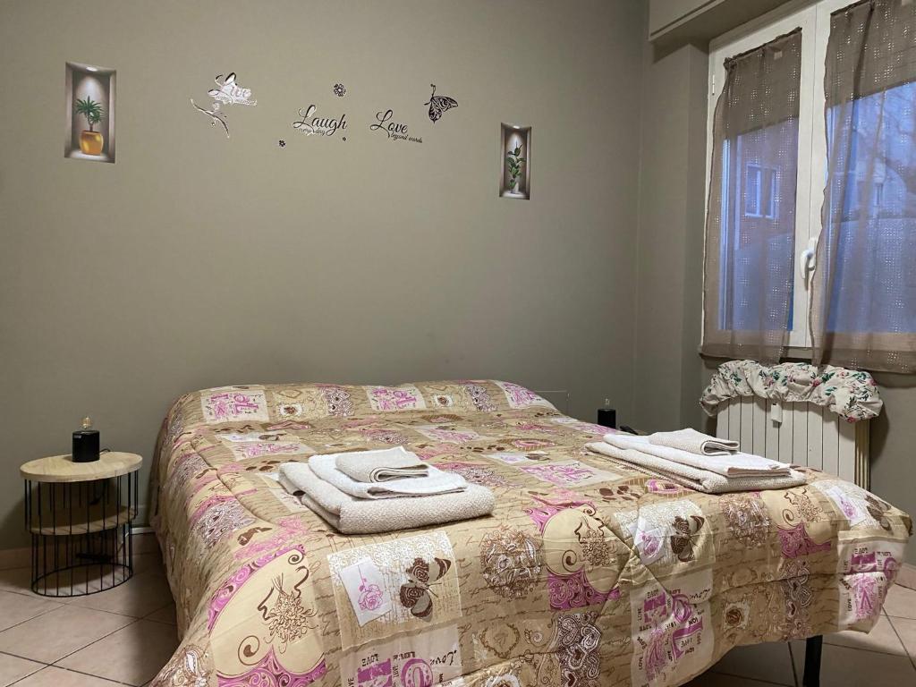 Postel nebo postele na pokoji v ubytování Casa Giulia FORUM ASSAGO M2 M1 Milano CENTRO