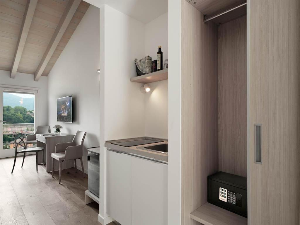 TV a/nebo společenská místnost v ubytování Residence Caffè Maya