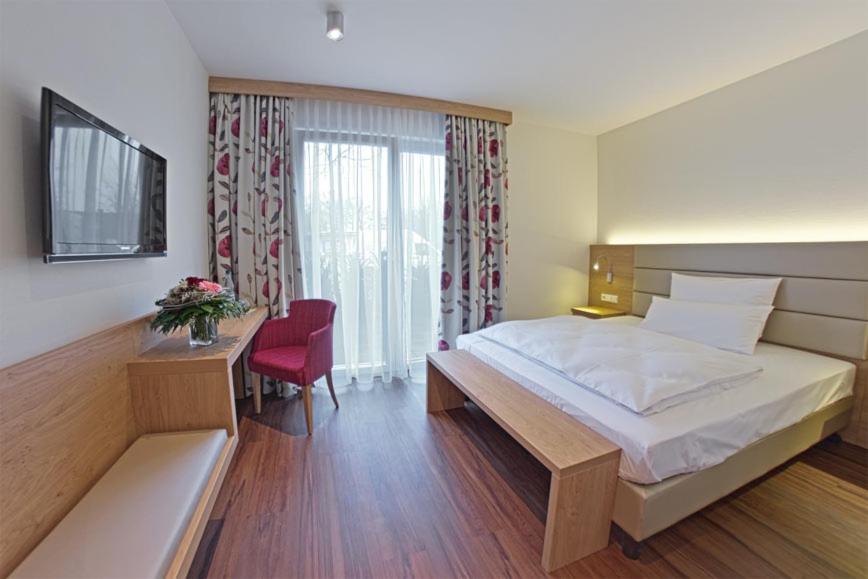 Postel nebo postele na pokoji v ubytování Hotel Wübbel