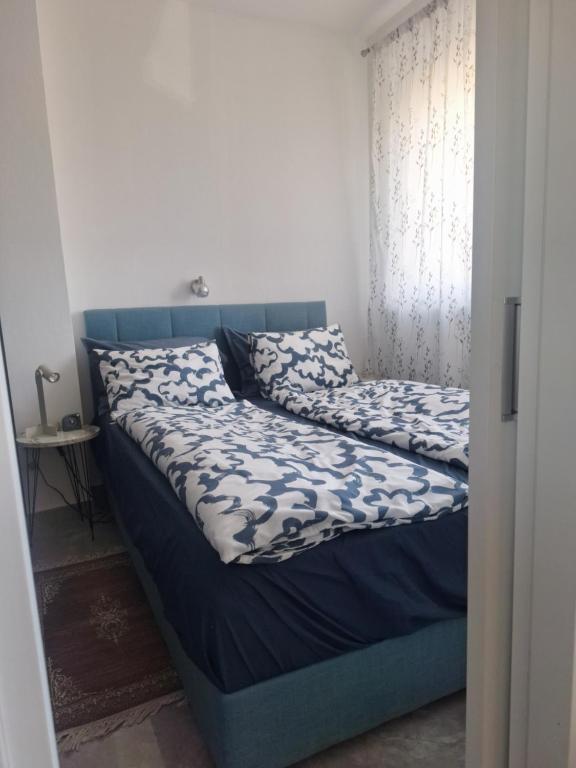 Postel nebo postele na pokoji v ubytování Apartman u Zemunu