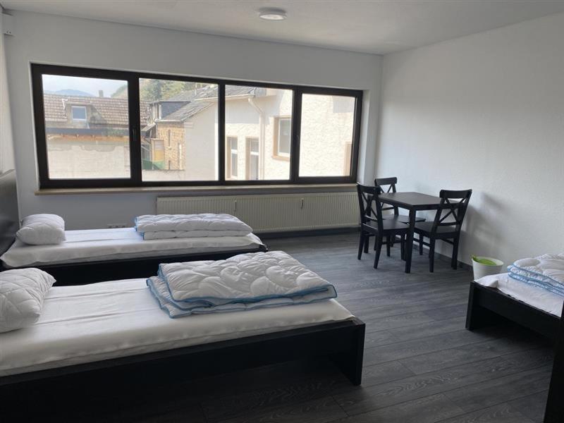 Ένα ή περισσότερα κρεβάτια σε δωμάτιο στο Ferienzimmer Nr 26