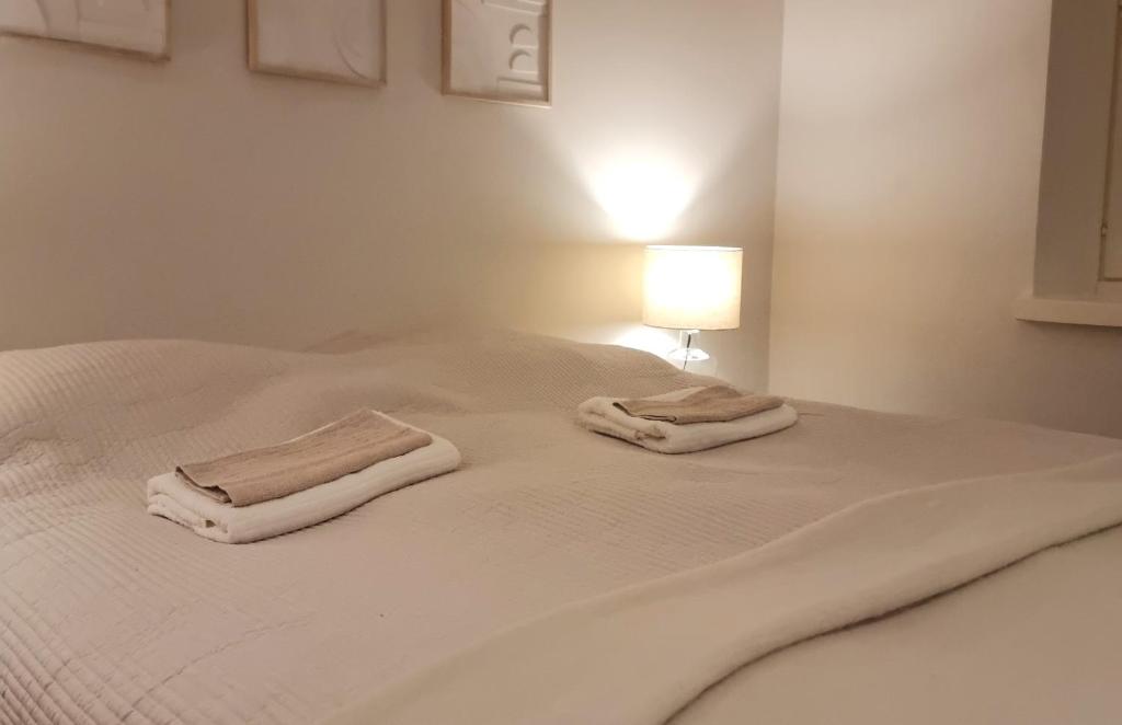 Postel nebo postele na pokoji v ubytování IM Apartments - with private jacuzzi and sauna in the heart of Vaasa