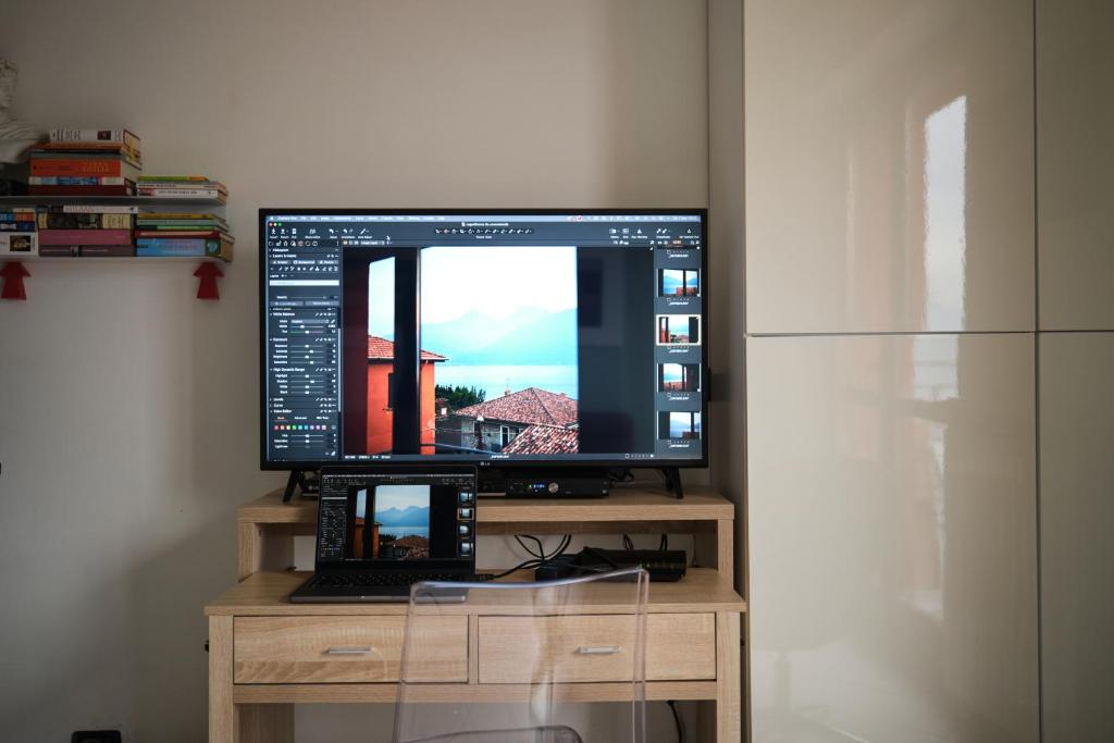 Een TV en/of entertainmentcenter bij Le Quattro Stagioni Lakeview

